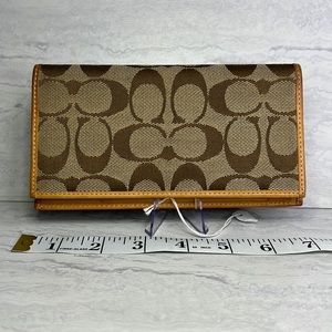 Coach pocket book